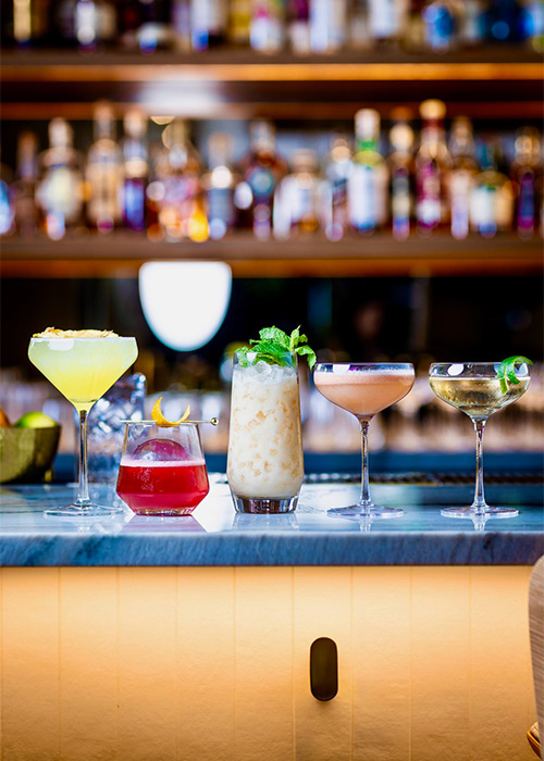 Gregory Gourdet, chef et fondateur du restaurant haïtien Kann de Portland, a ouvert son bar sœur Sousòl en 2022 afin que ses invités puissent vivre une expérience culinaire caribéenne accrue et plus complète avec un accent particulier sur Haïti.